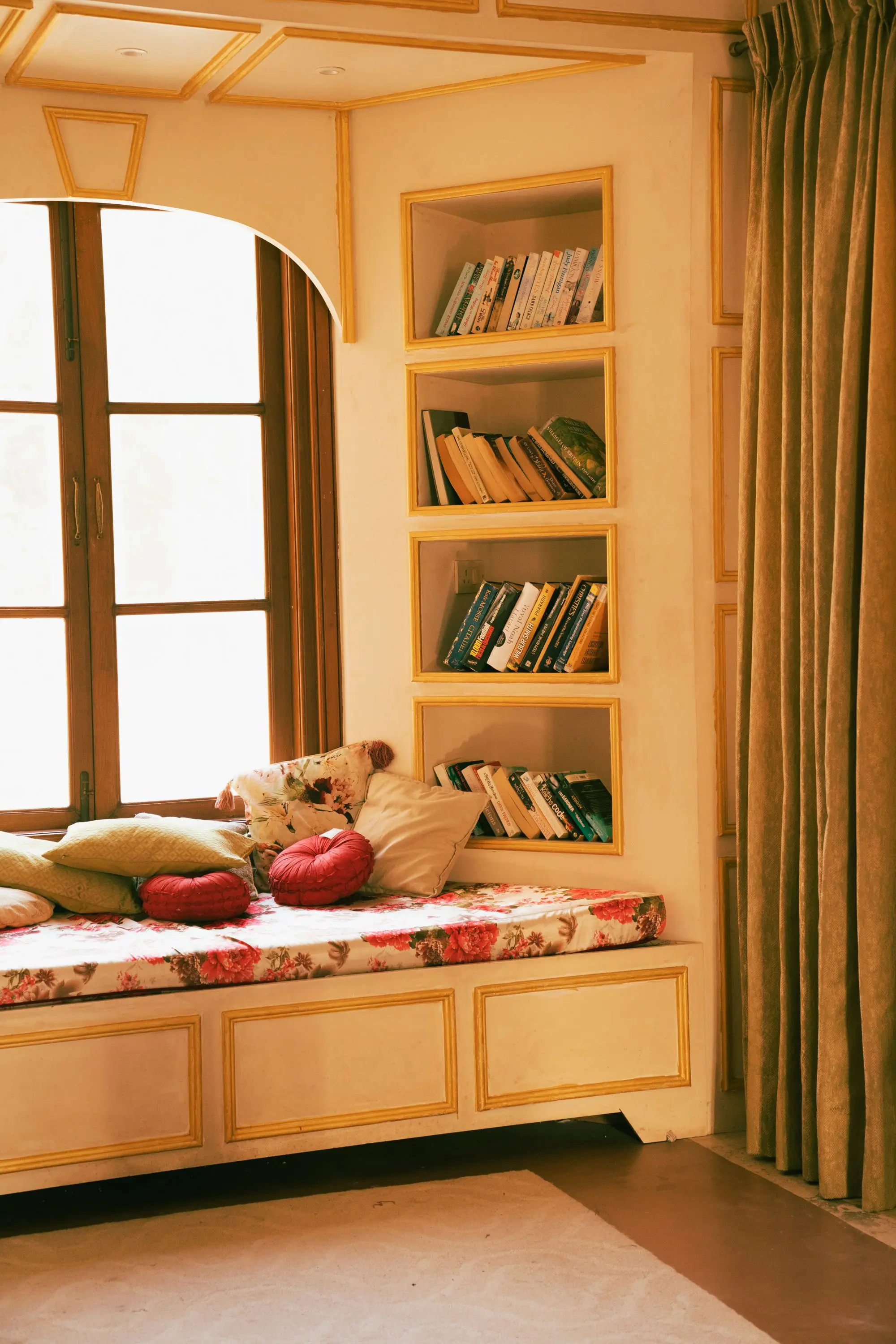 Reading nook with a built-in window seat and shelves