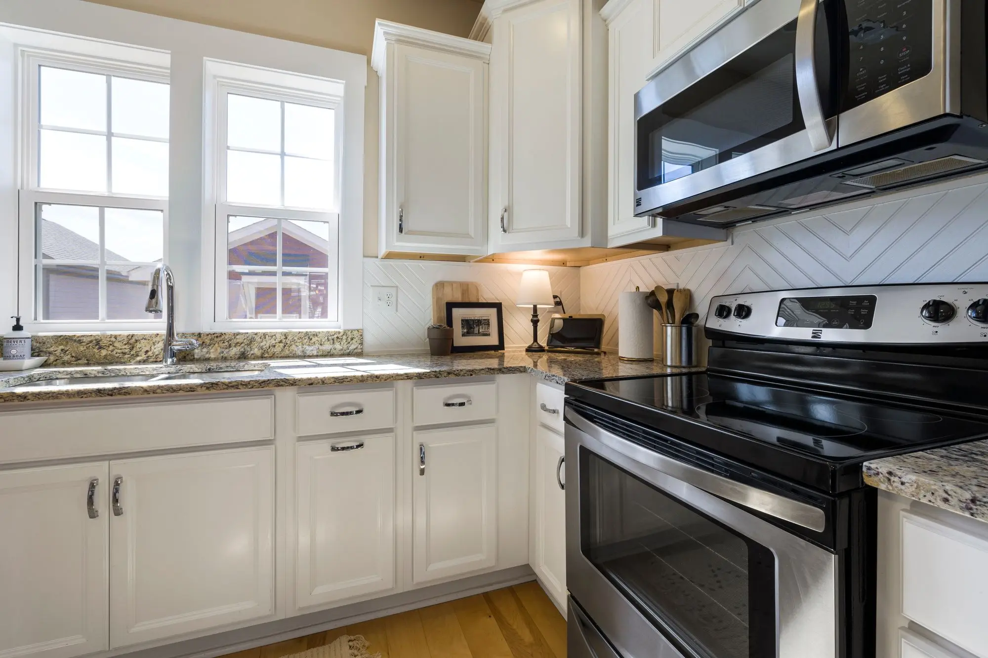Bright kitchen with freshly painted white cabinets