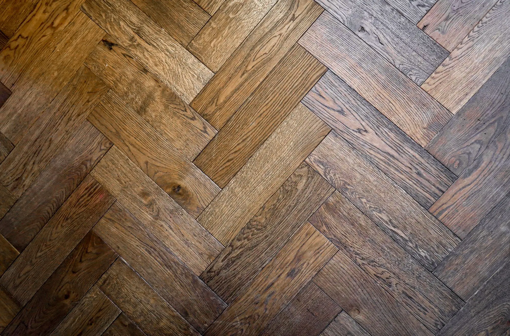 Herringbone parquet floor in warm oak